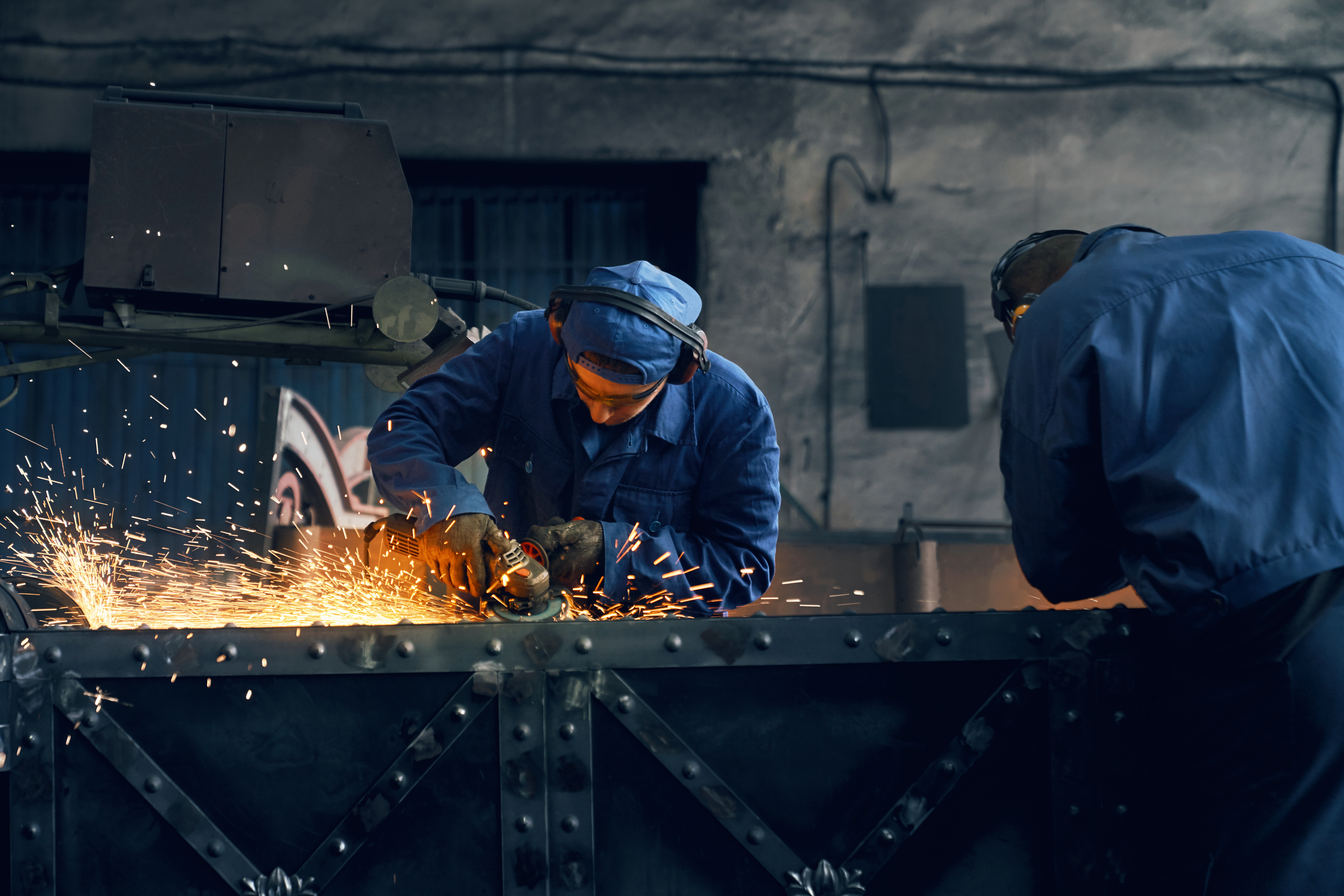 Manufacturing Worker Welding Metal